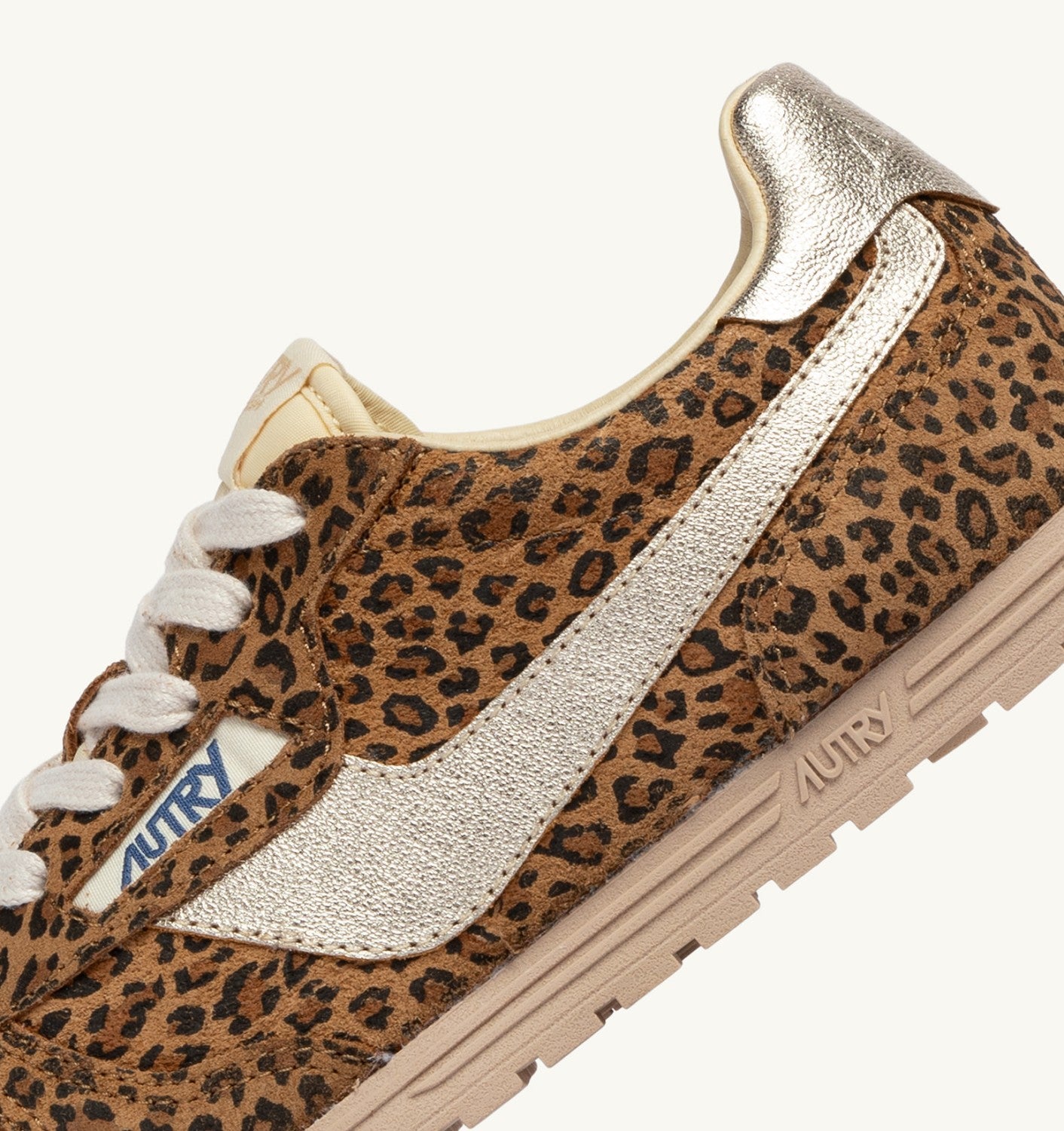 ZAPATILLAS WINDSPIN DE ANTE Y PIEL LEOPARD Y PLATINO