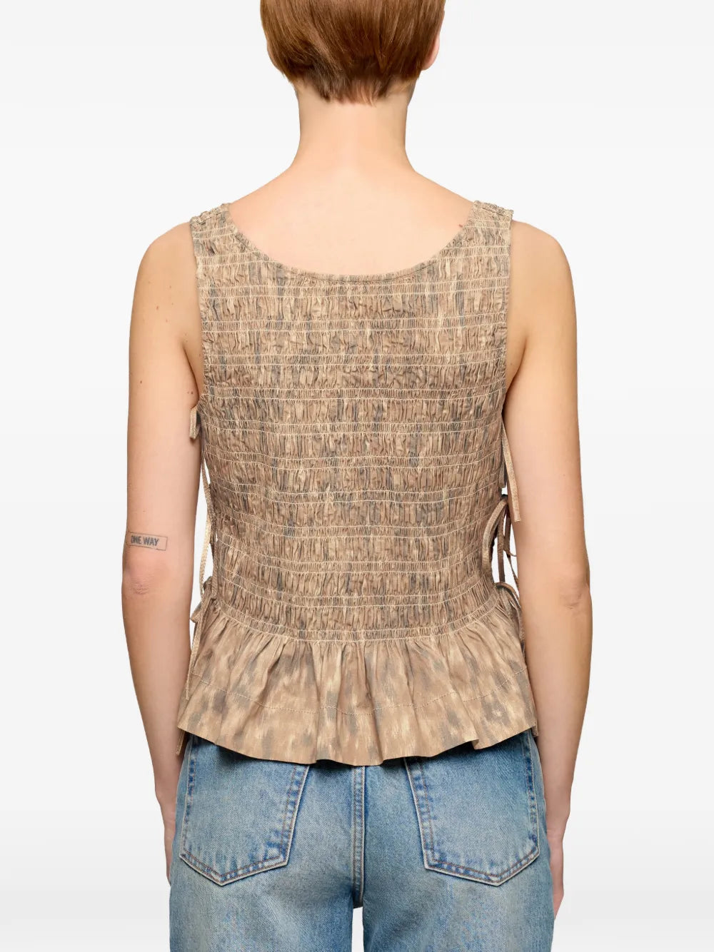 TOP HOLGADO DE TELA ELASTICA ESTAMPADA