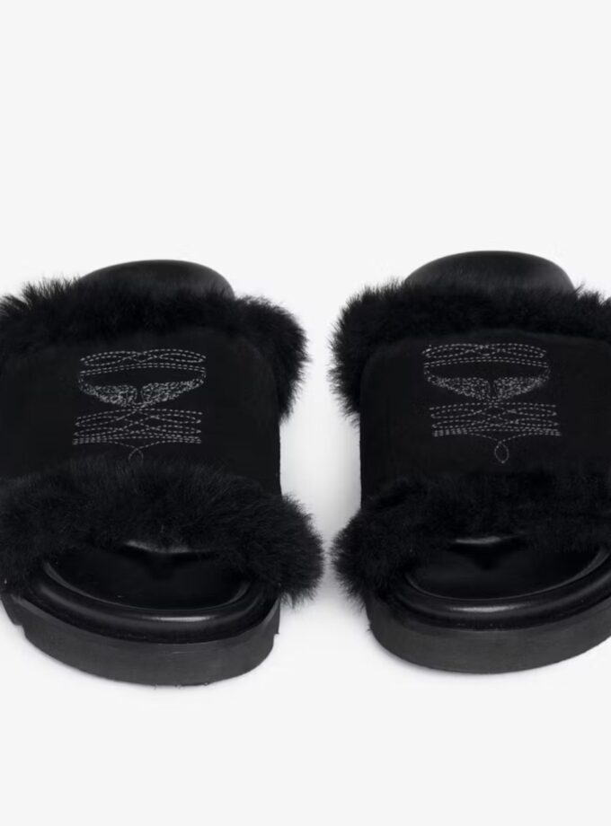 Mules abiertas de ante y shearling adornadas con bordados distintivos y equipadas con suelas anatómicas cómodas. ZADIG ET VOLTAIRE